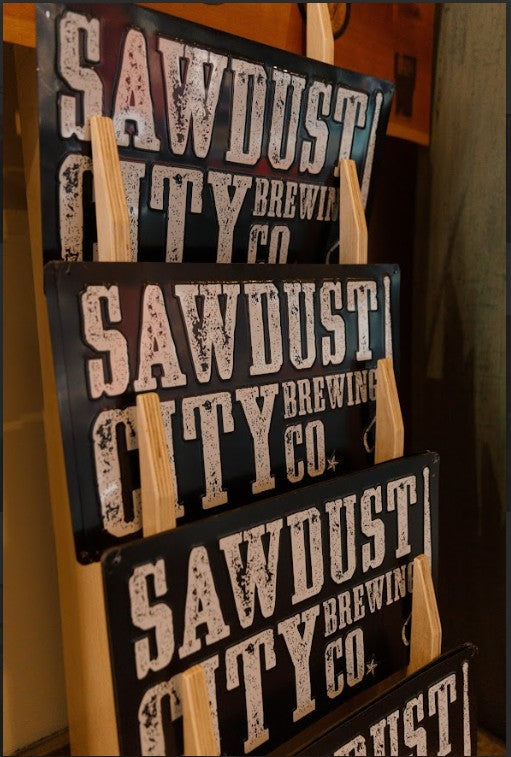 Sawdust City Metal Tacker Sign